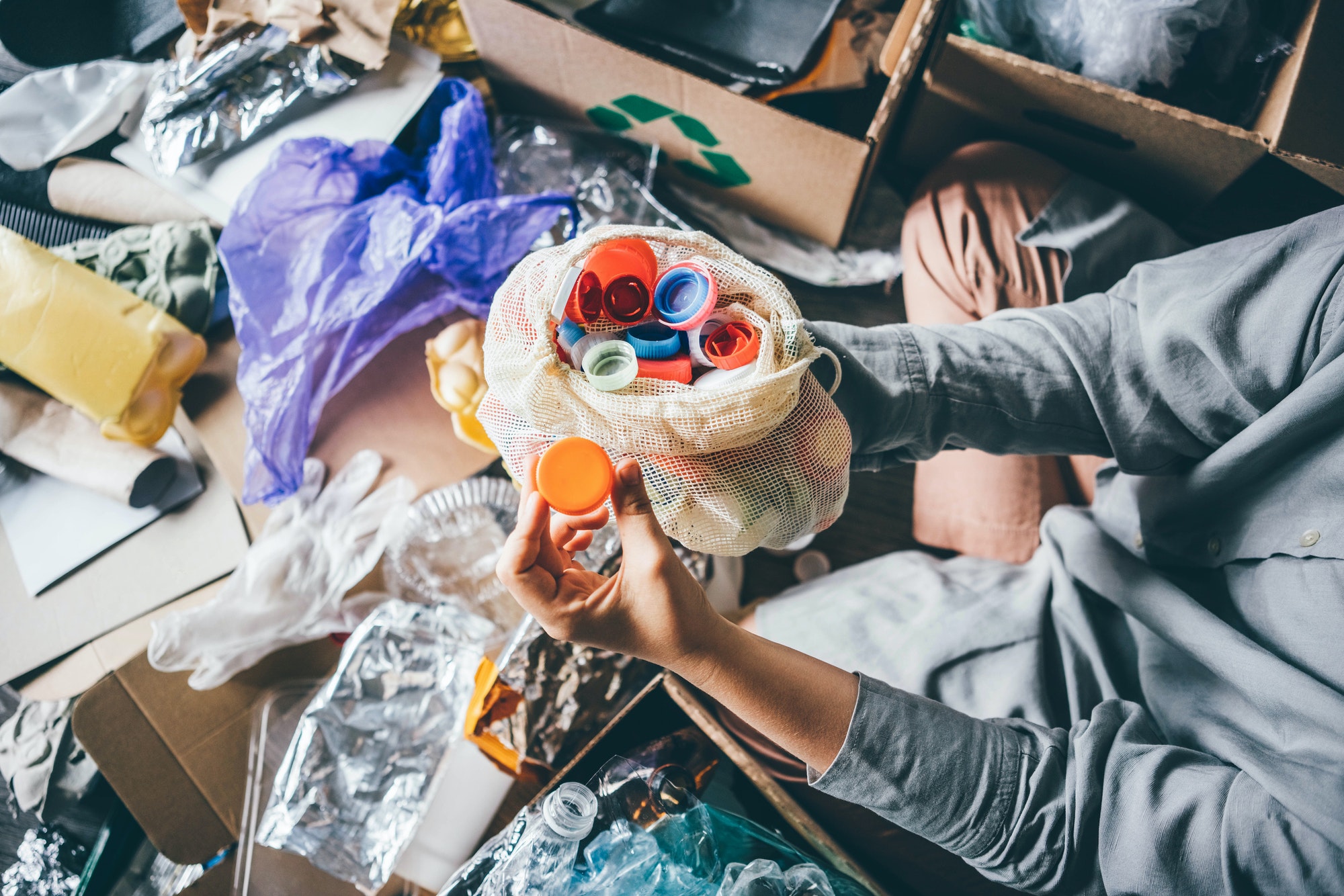 woman-sorting-different-waste-girl-holding-a-plastic-cap-recycling-and-ecology-concept-.jpg woman-sorting-different-waste-girl-holding-a-plastic-cap-recycling-and-ecology-concept-.jpg